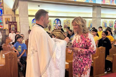 The principal of the Assumption of the Blessed Virgin Mary School was received into the Catholic Church