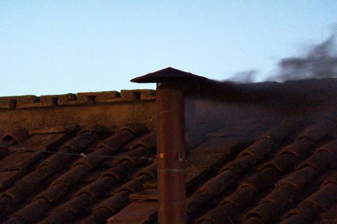 Black smoke signals end of first day of conclave